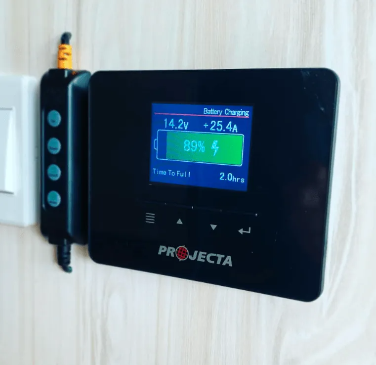Projecta Battery Charger Displaying 14.2v and 25.4a Charging a Battery — All Coast Auto Solutions in Noosaville, QLD