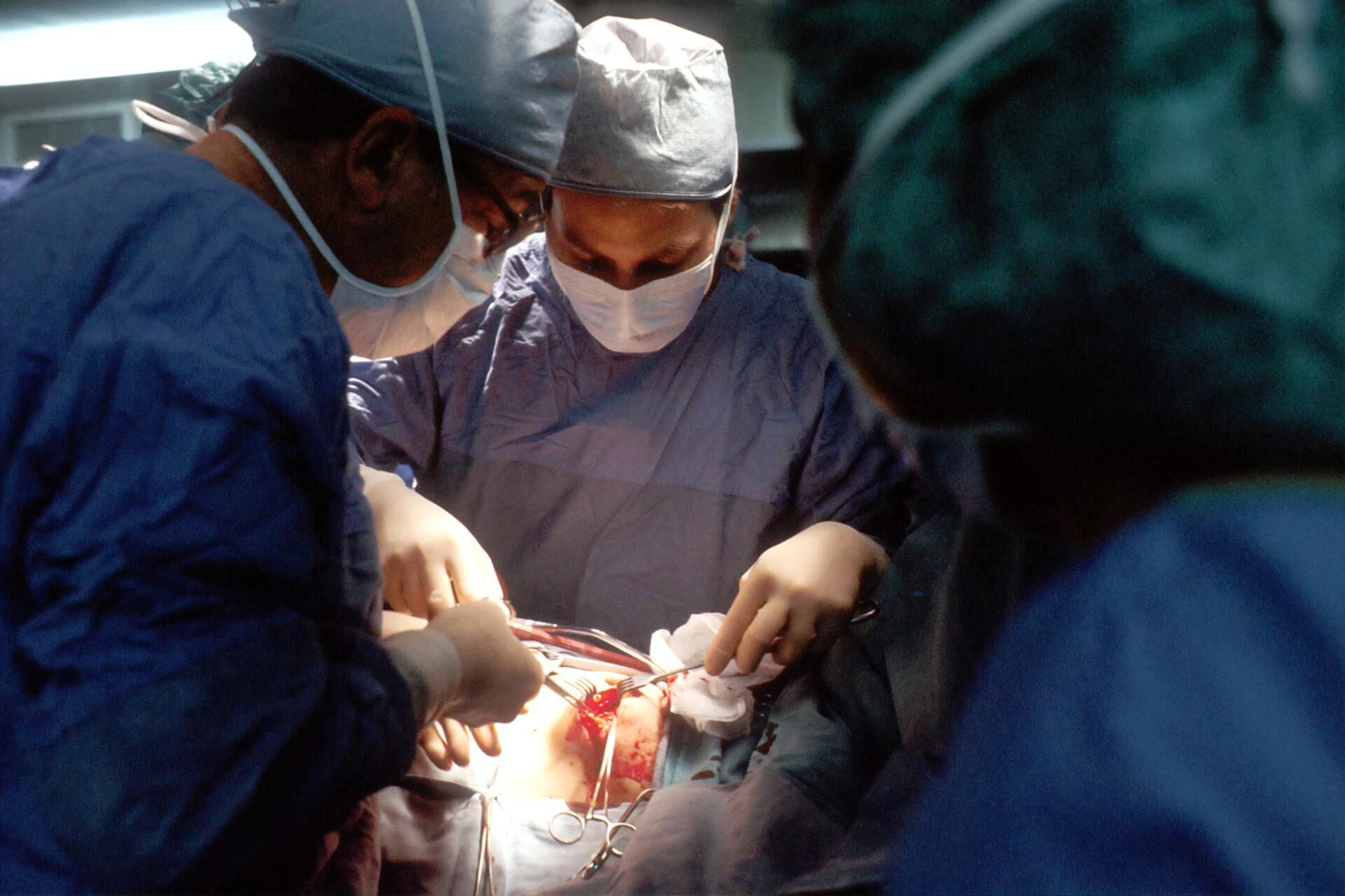 doctors performing a surgery