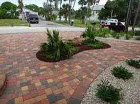 Driveway with Landscape — Sarasota, FL — Custom Pavers of Southwest Florida