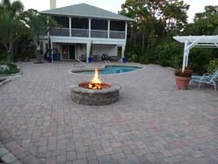 Patio with Pool and Fire Pit — Sarasota, FL — Custom Pavers of Southwest Florida