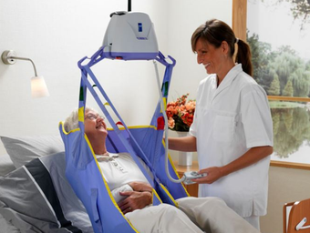 patient using ceiling lift