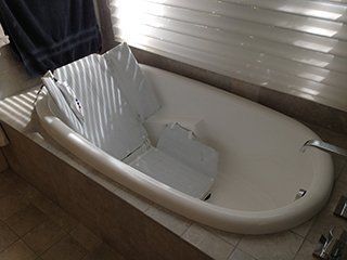 handicapped accessible bathtub with wheelchair bathroom access