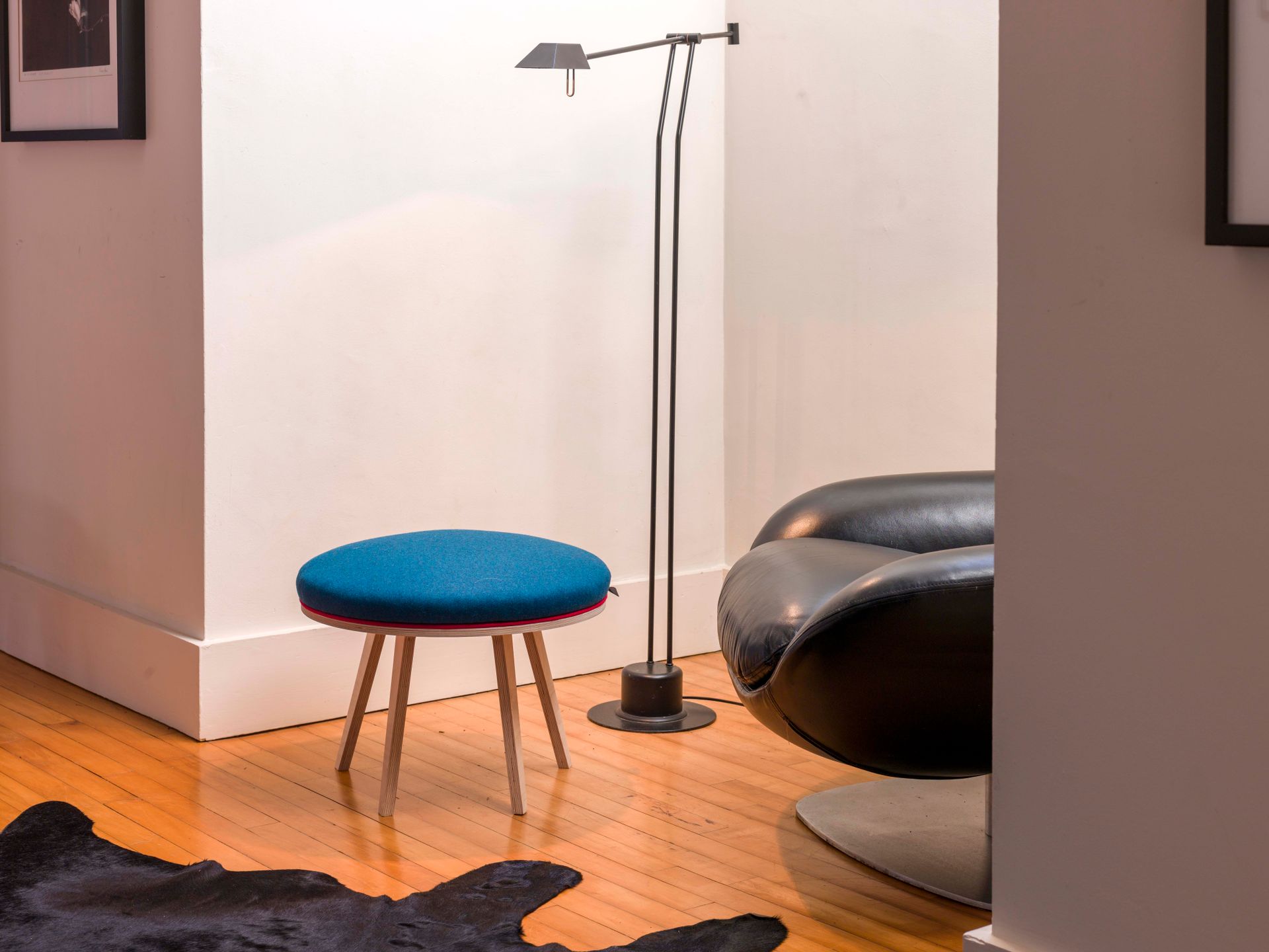 Marine upholstered modern round birch ply footstool with piping