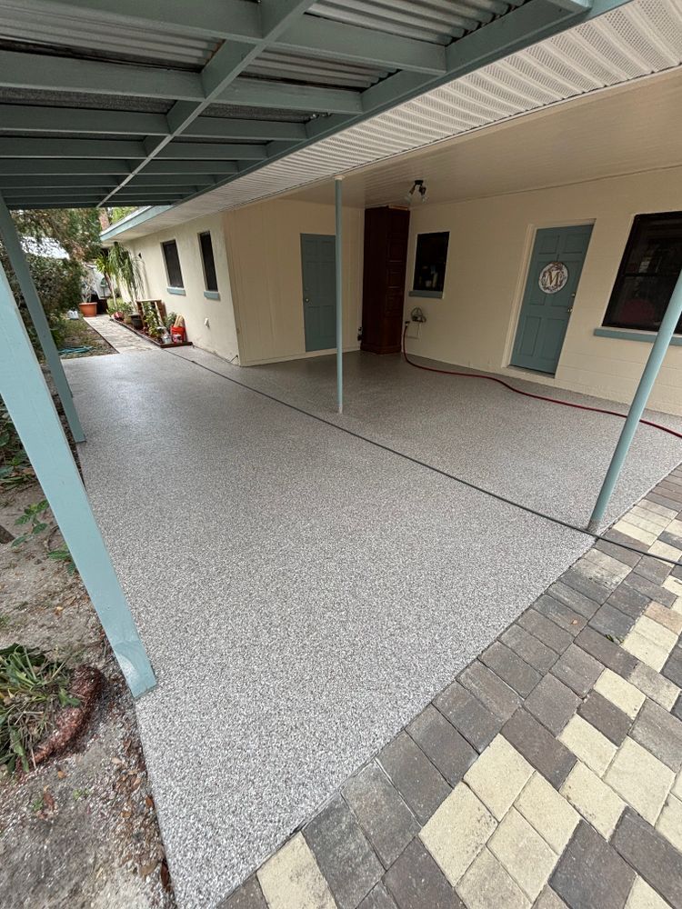 A covered walkway leading to the front door of a house.
