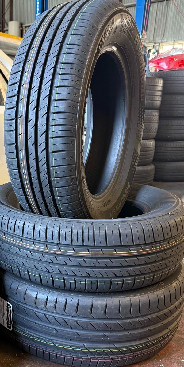 Two Tires Are Stacked on Top of Each Other in a Warehouse — ABIV Automotive In Richlands, QLD