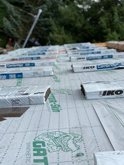 Installing Shingles — Olympia, WA — Raincover Roofing LLC