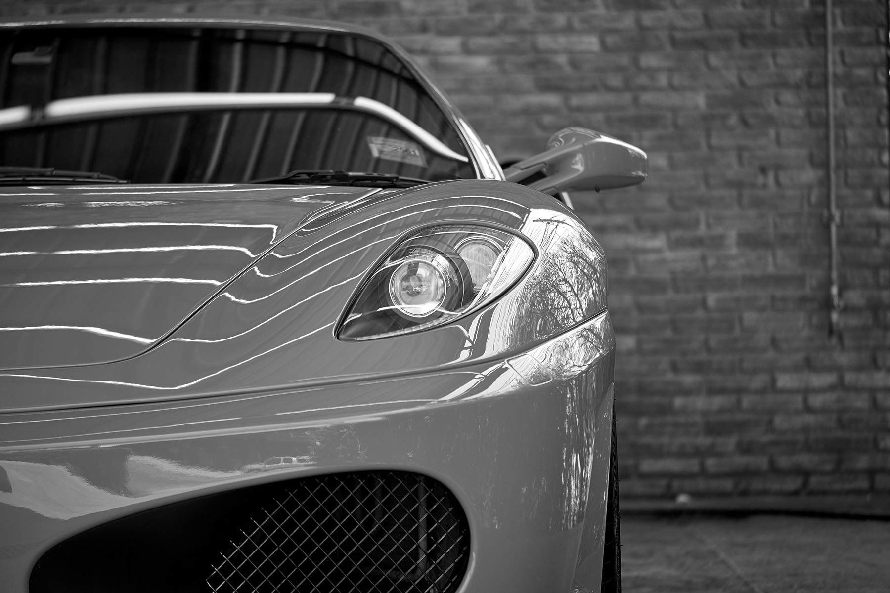 A Close Up Of A Car 's Headlights On A Black Background — Advanced Auto Tech In Port Macquarie, NSW