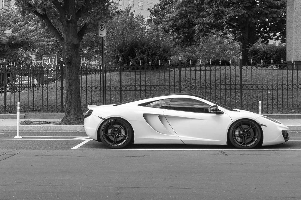 A Sports Car Is Parked On The Side Of The Road — Advanced Auto Tech In Port Macquarie, NSW