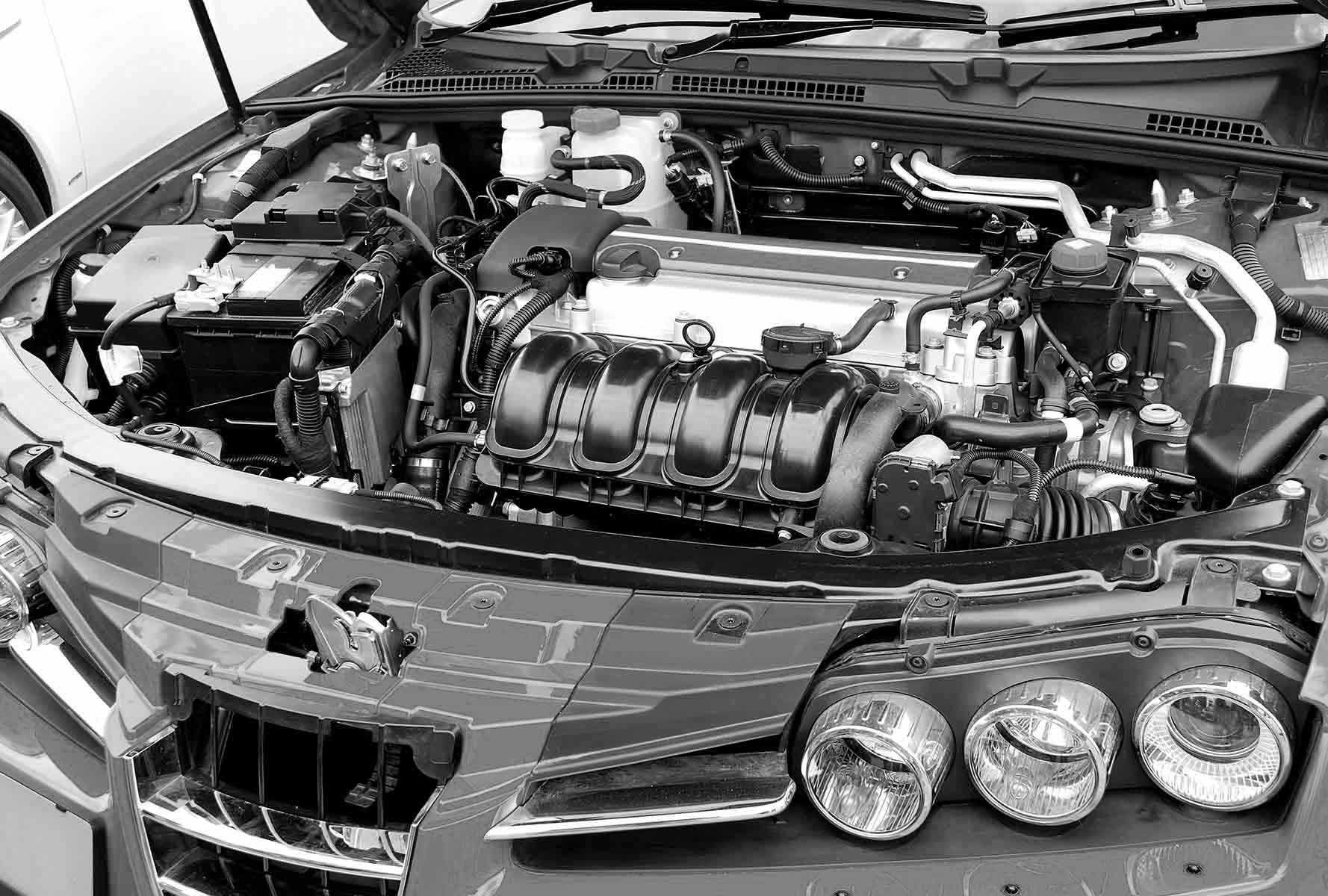The Engine Of A Car Is Shown With The Hood Open — Advanced Auto Tech In Port Macquarie, NSW