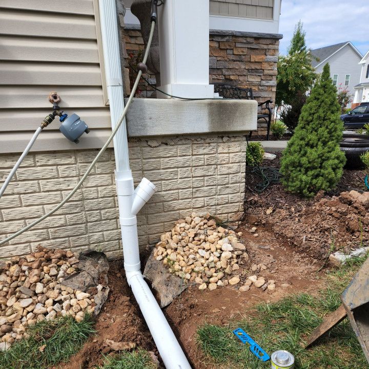 Installing gutter from curbing landscapes