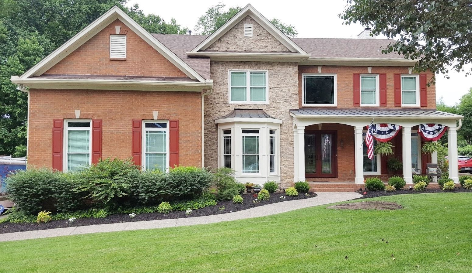 Man Holding New Window — Hendersonville, TN — Sumner Roofing & Exteriors