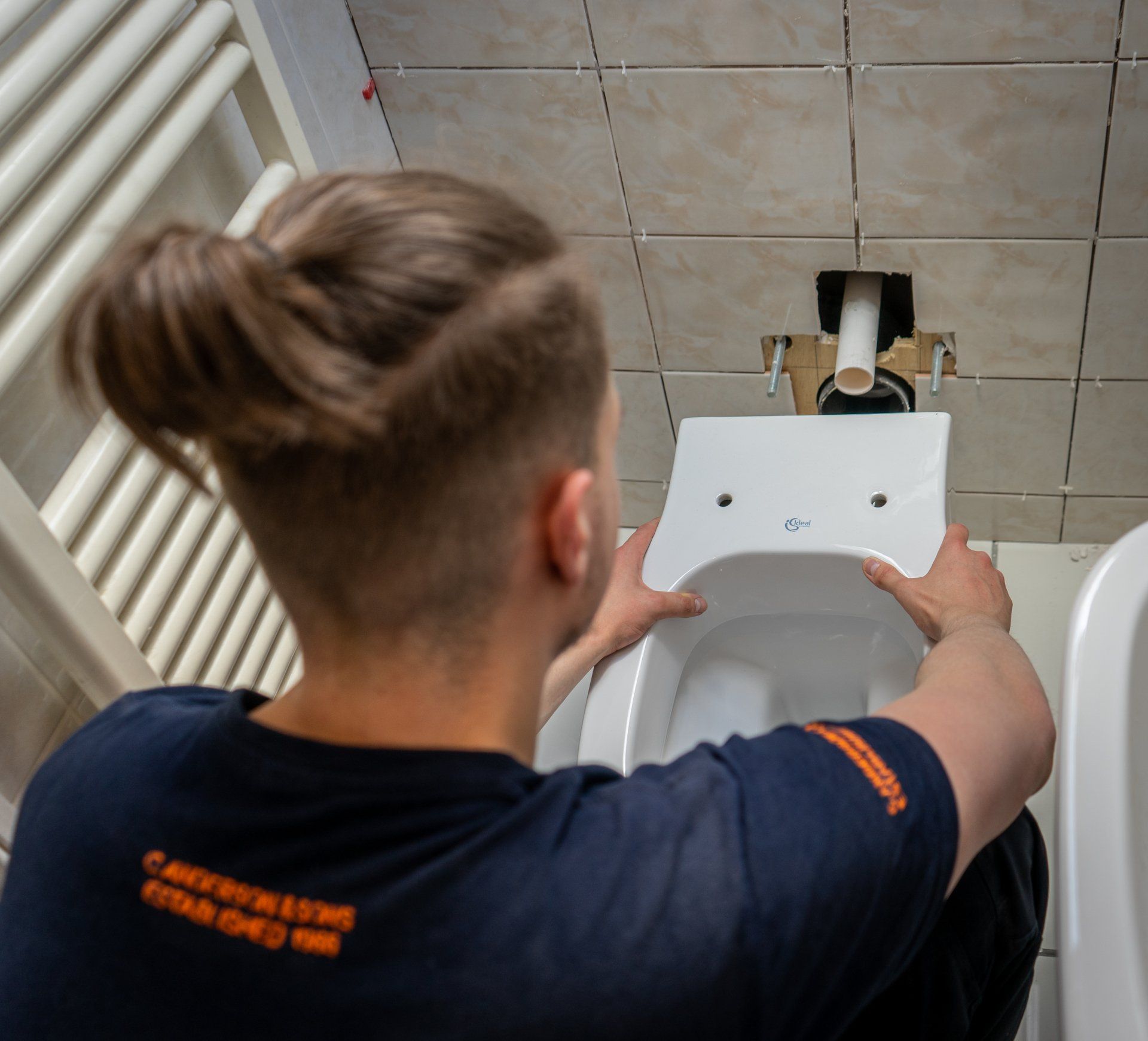 Plumbing services - Toilet Installation - Anderson & Sons