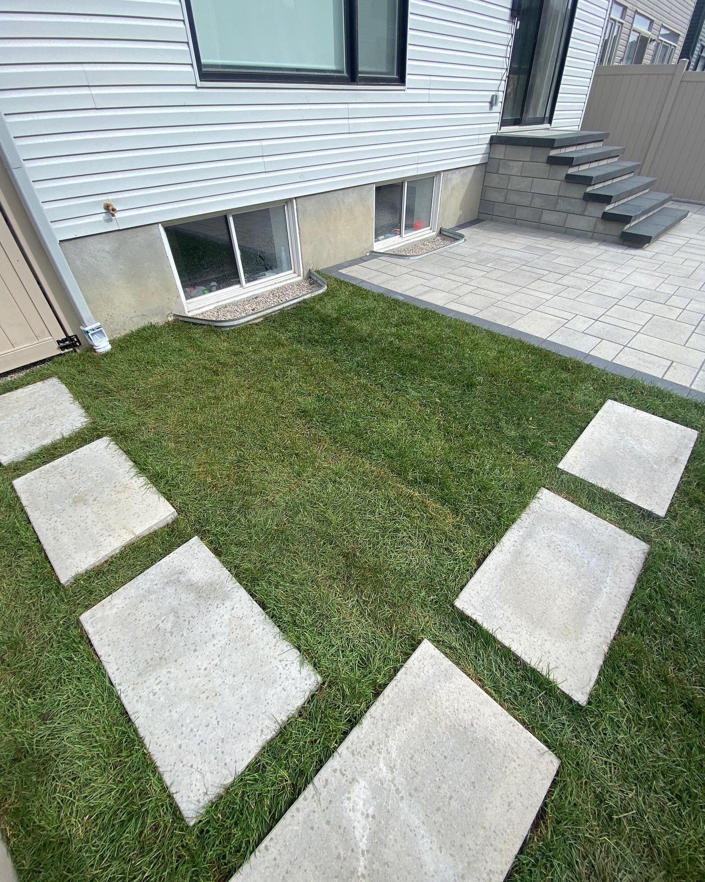 landscaping elements in front of a house