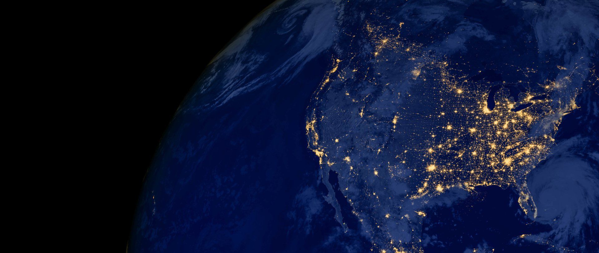 Graphic image of United States with satellite areas highlighted as lights/Links to the Capabilites web page information on analytics and intelligent operations