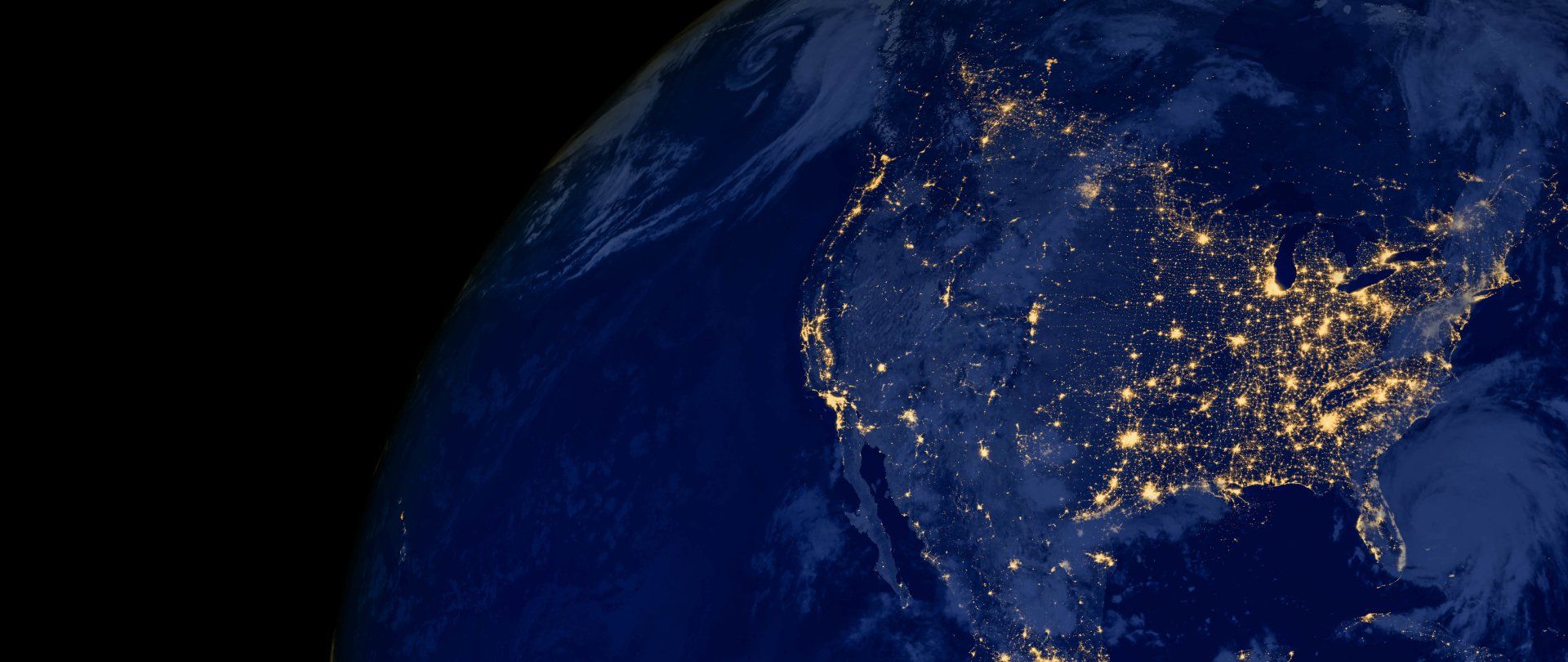 Graphic image of United States with satellite areas highlighted as lights/Links to the Capabilites web page information on analytics and intelligent operations
