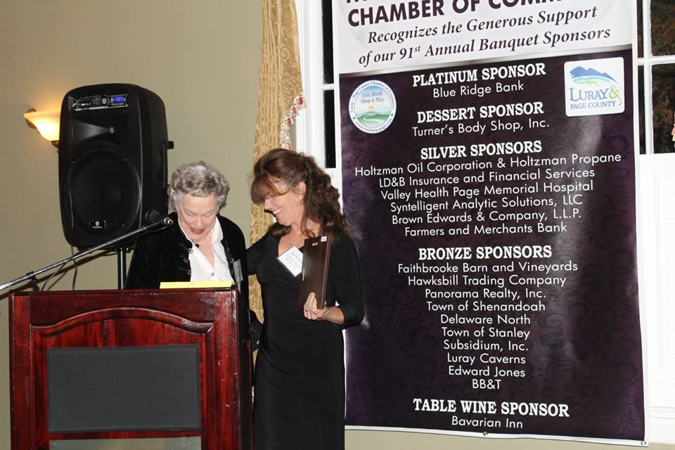 Syntelligent employee Rose Ann Smythe receiving Chamber award