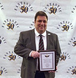 Stephen Synnott with Fantastic 50 award