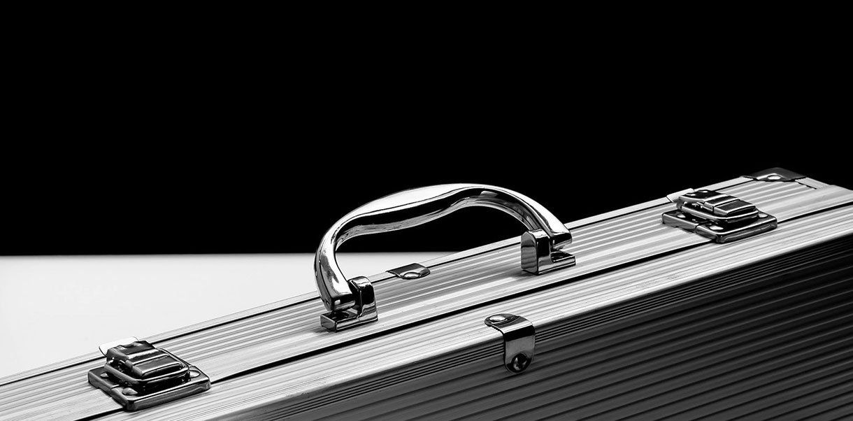 image of metal briefcase/Links to the capabilities web page on IT security