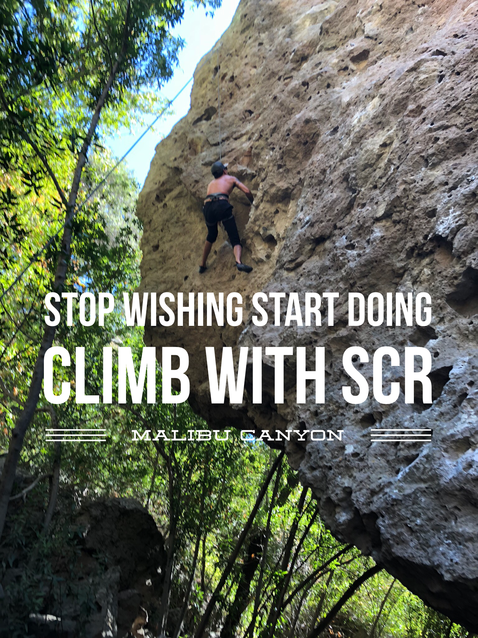 Rock climber on a cliff face. 