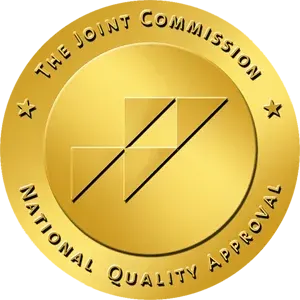 Gold seal: The Joint Commission National Quality Approval logo.