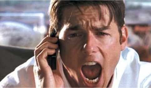 A man is screaming while talking on a cell phone.