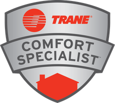 Trane Comfort Specialist badge: silver shield with red house and Trane logo.