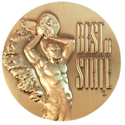 Gold medal with Atlas figure holding globe, text 