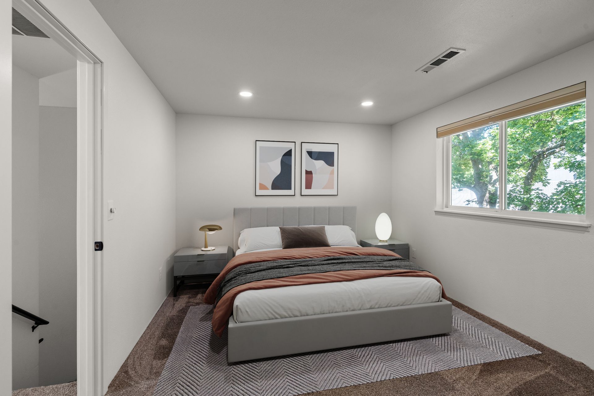 An artist 's impression of a bedroom with a large bed and a window.