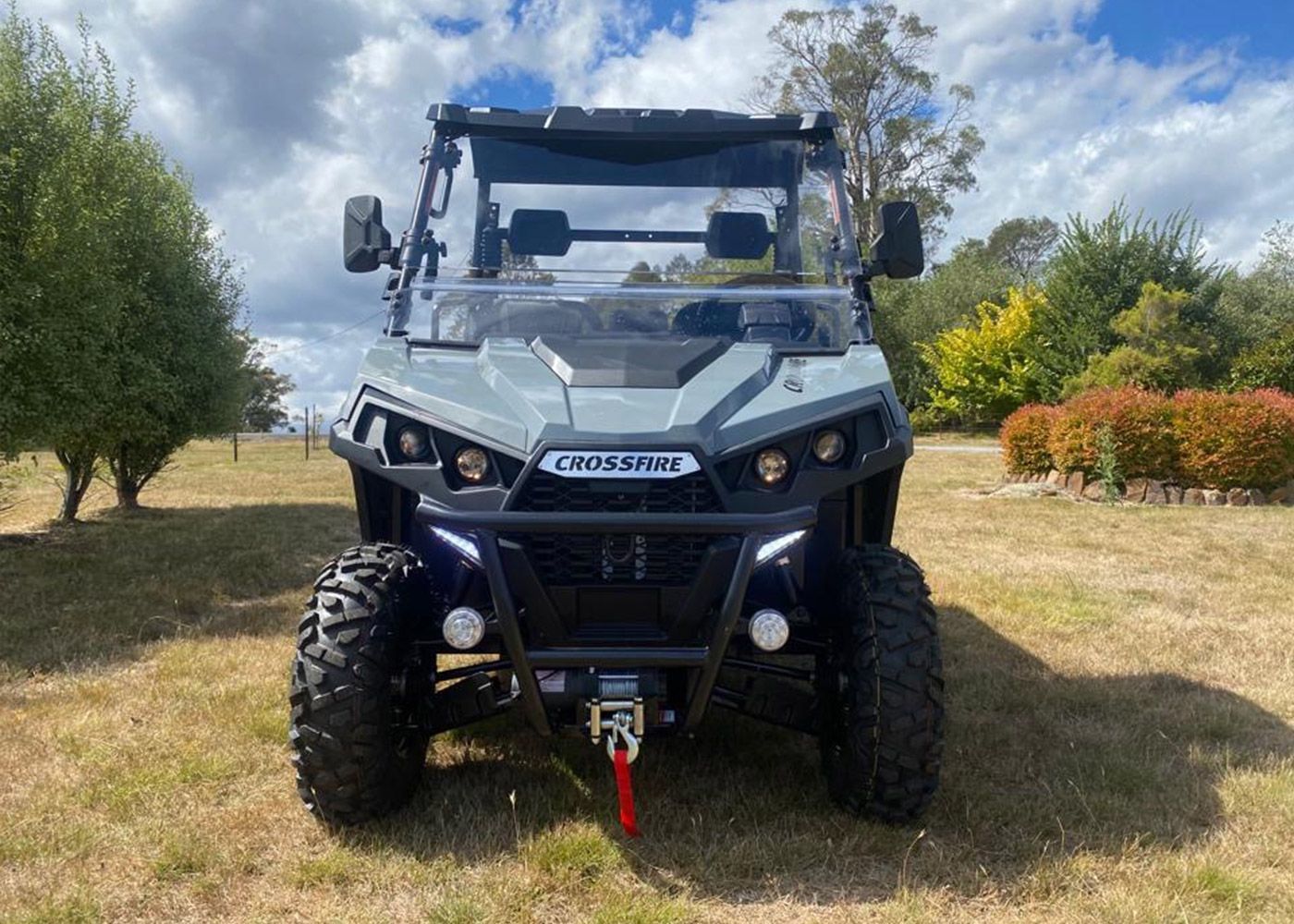 A Gray and Black Atv With a Cargo Bed on a White Background — MPE Adventure Quads & Bikes In Thornton, NSW