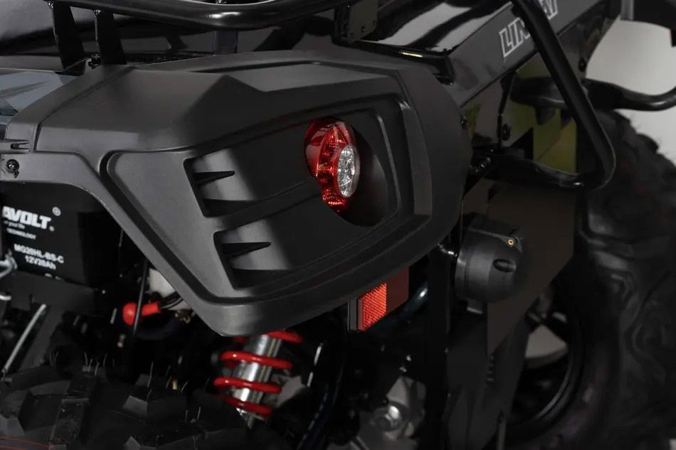 A Close Up of a Black Atv With a Red Light on the Side — MPE Adventure Quads & Bikes In Pokolbin, NSW