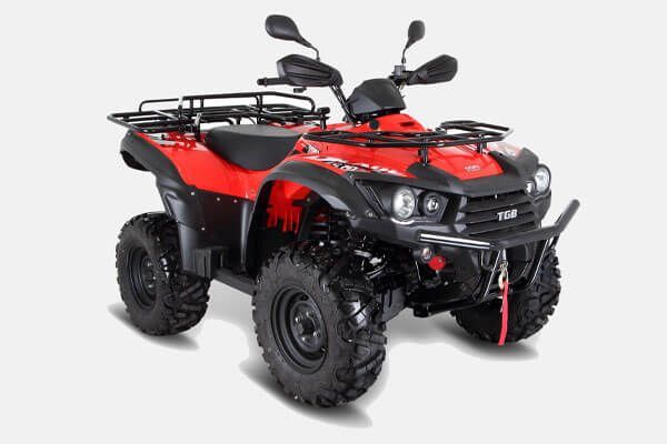 A red and black atv is parked on a white background — MPE Adventure Quads & Bikes In Muswellbrook, NSW