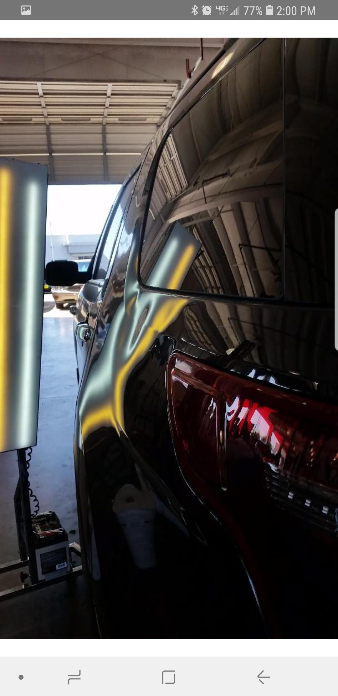 Paintless dent repair before and after.