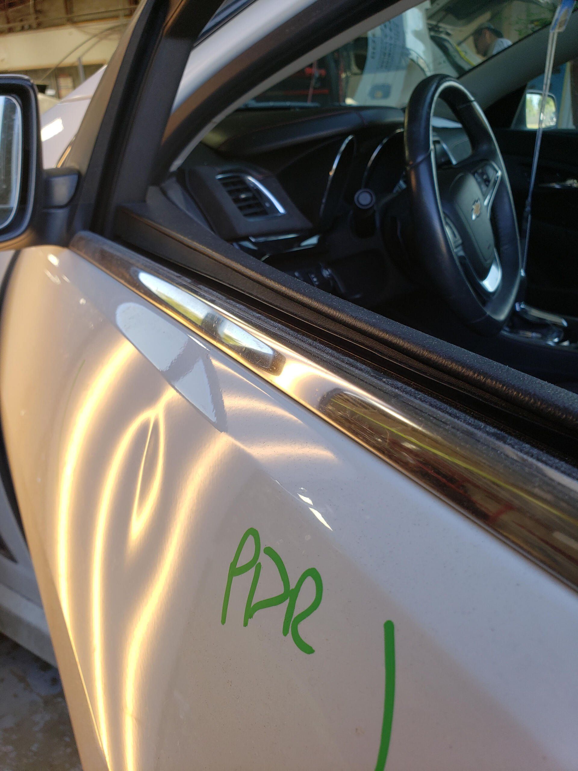 Door ding dent repair before and after.