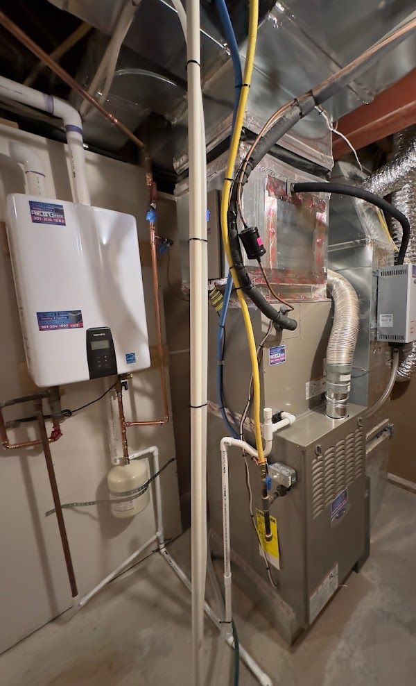 Furnace and tankless water heater installation service by Alex HVAC Service LLC in basement