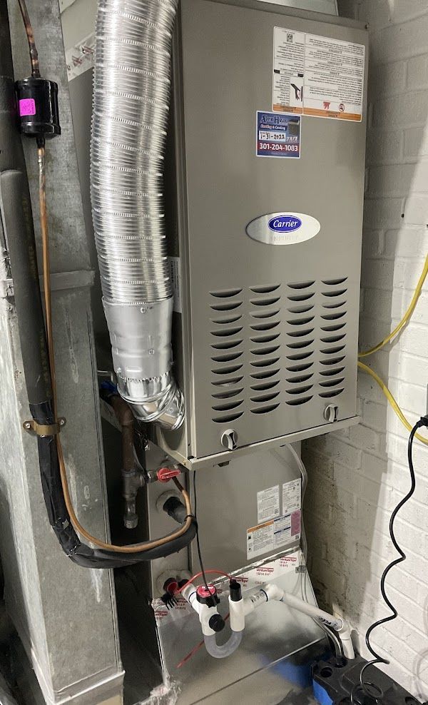 Carrier furnace installation by Alex HVAC Service LLC with ductwork and drain setup