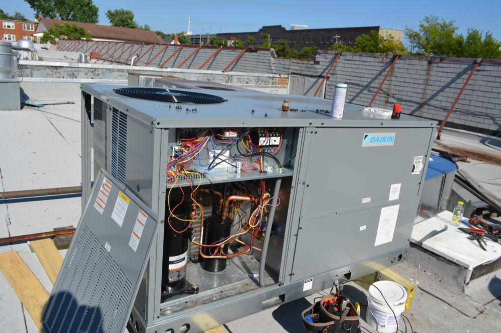 Commercial HVAC installation with Daikin rooftop unit by Alex HVAC Service LLC