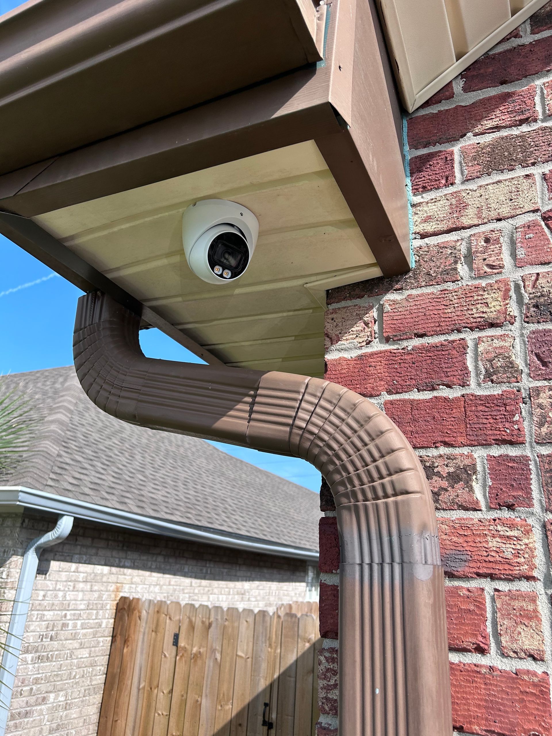 Outdoor security camera covering driveway