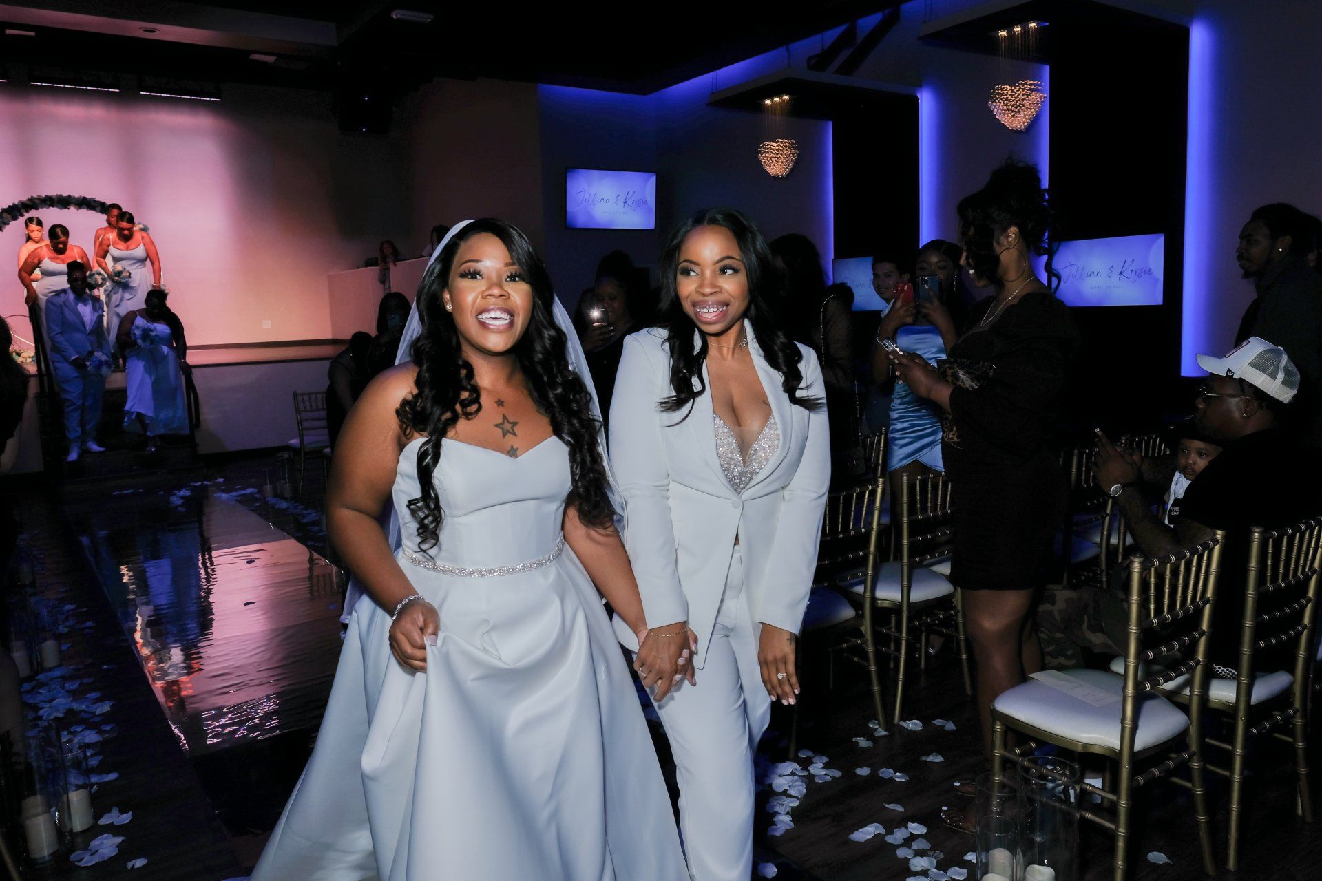 couple walking down aisle shot from a Wedding Photography Package with De Vera Imagery