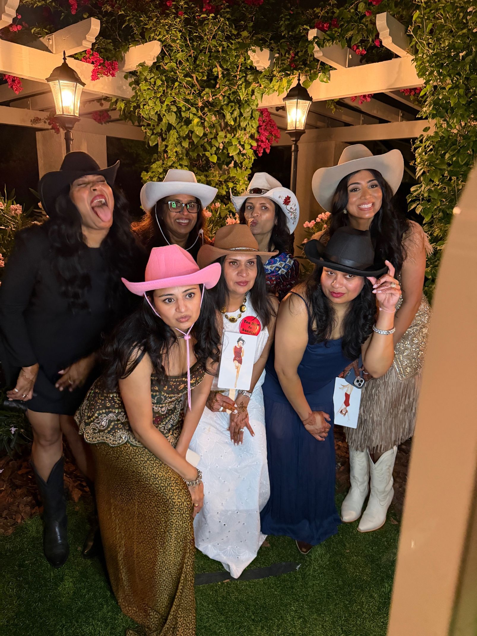 Two men standing next to a sign that says fiesta 360