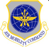 A logo for the air mobility command with a globe and arrows