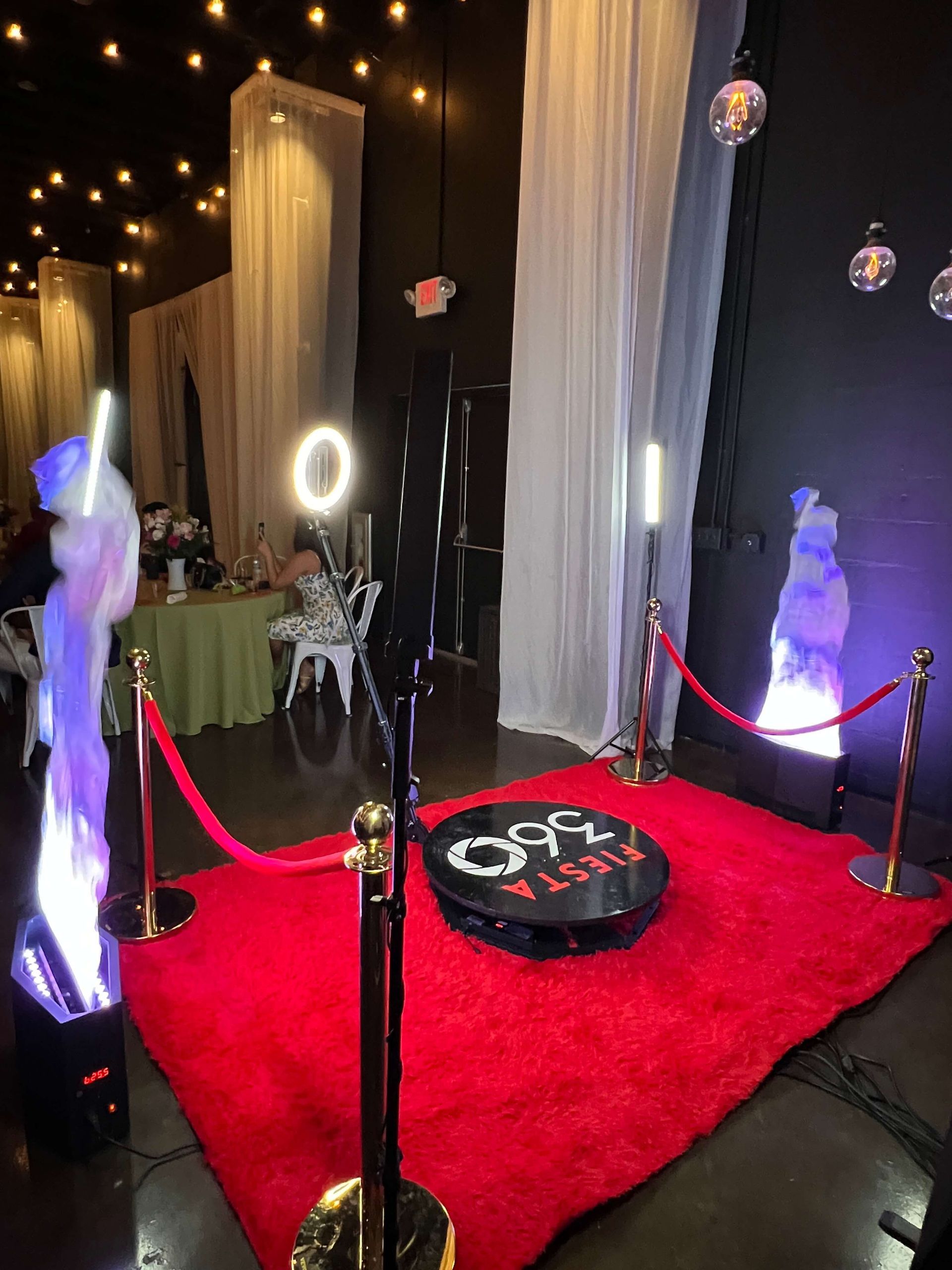 There is a red carpet in the middle of the room.
