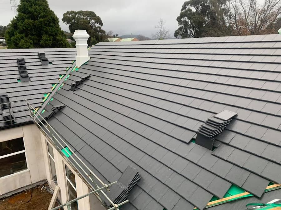 Installing Grey Tile Roof - Roof Replacement In Orange, NSW