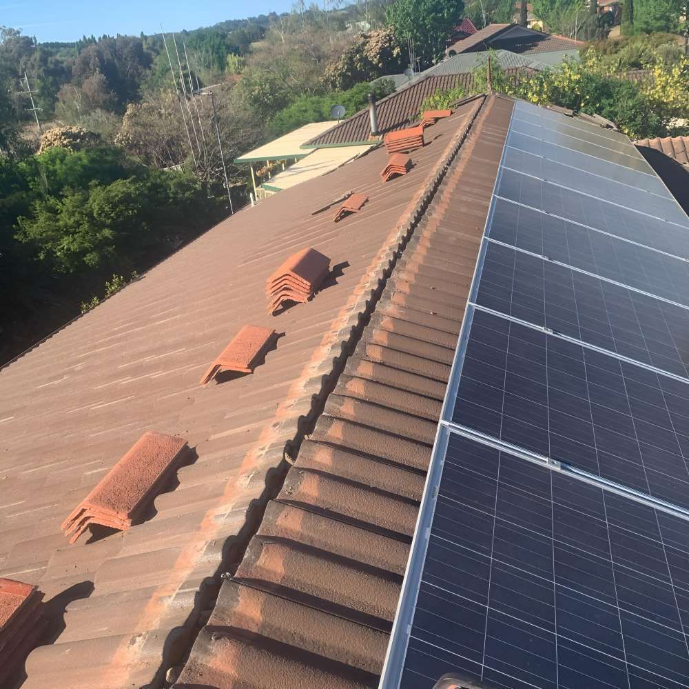 A Roof With A Lot Of Solar Panels On It — Lance Ward Roof Tiling in Orange, NSW