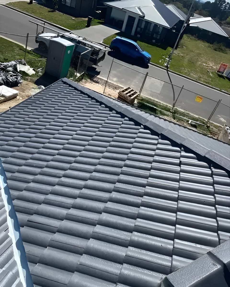 Black Tiled Roof — Lance Ward Roof Tiling in Forbes, NSW