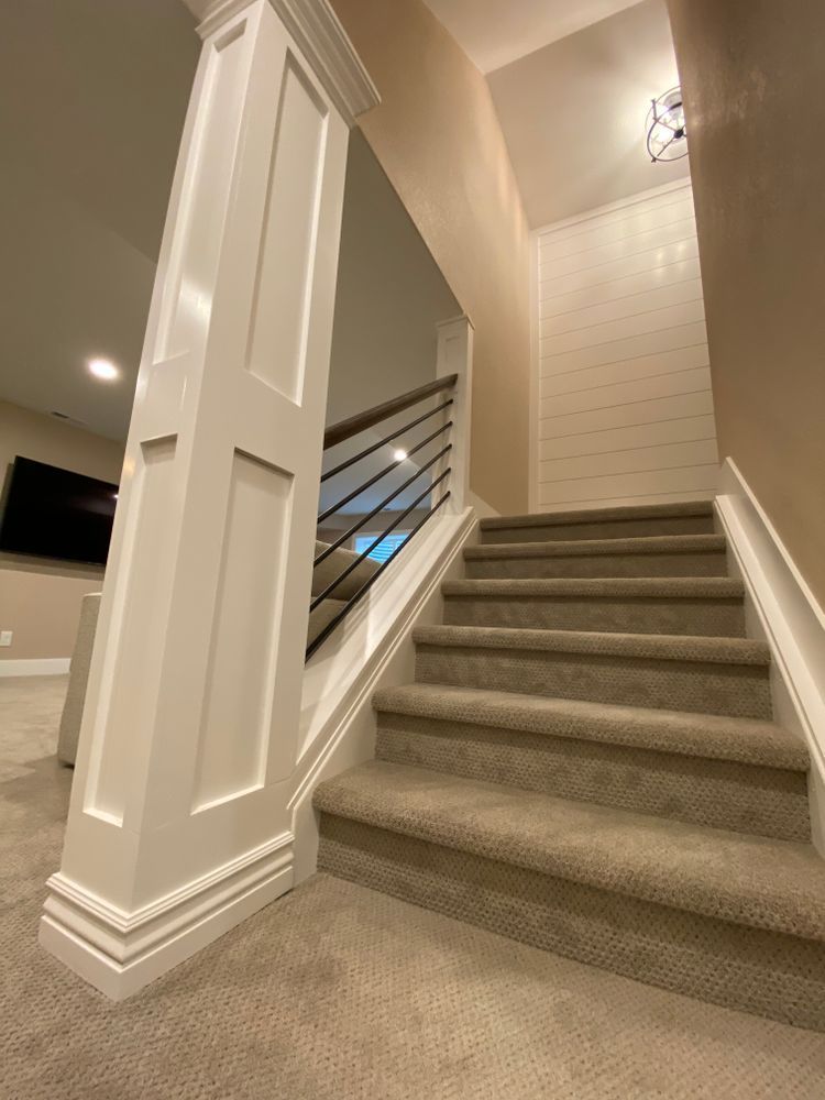 A set of stairs leading up to a second floor in a house.