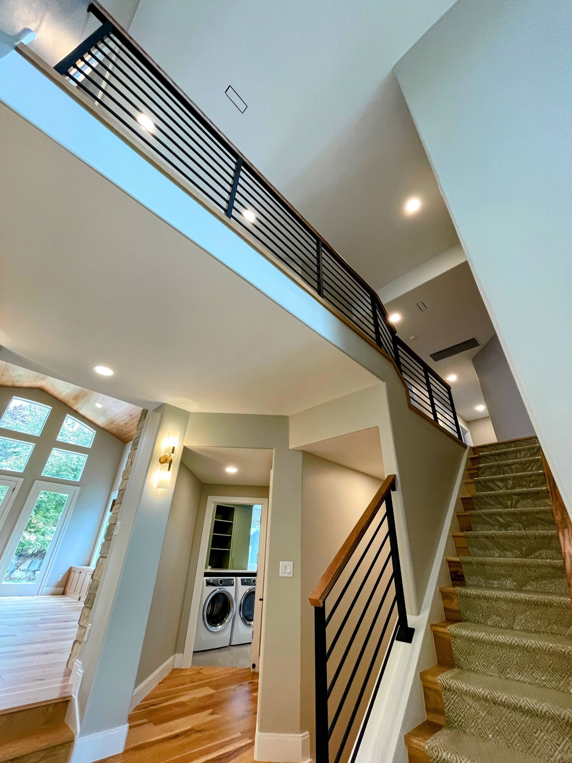 A staircase leading up to the second floor of a house