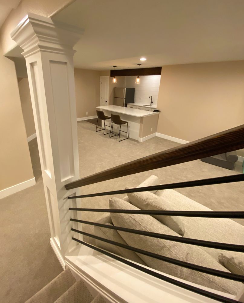 A view of a living room from the stairs