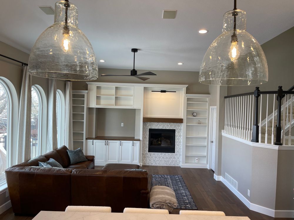 A living room with a couch and a fireplace