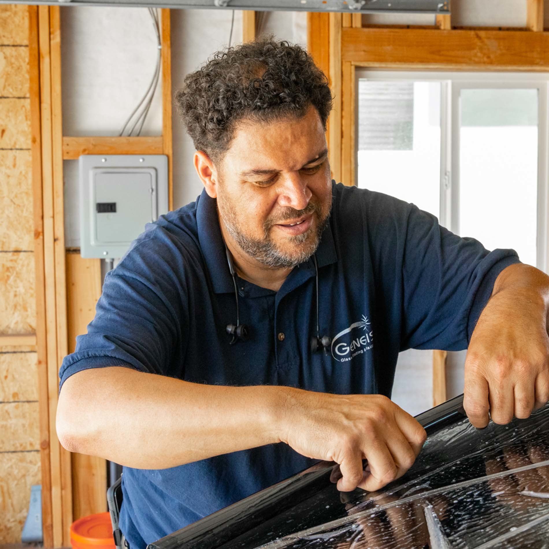 Owner Todd tinting car window