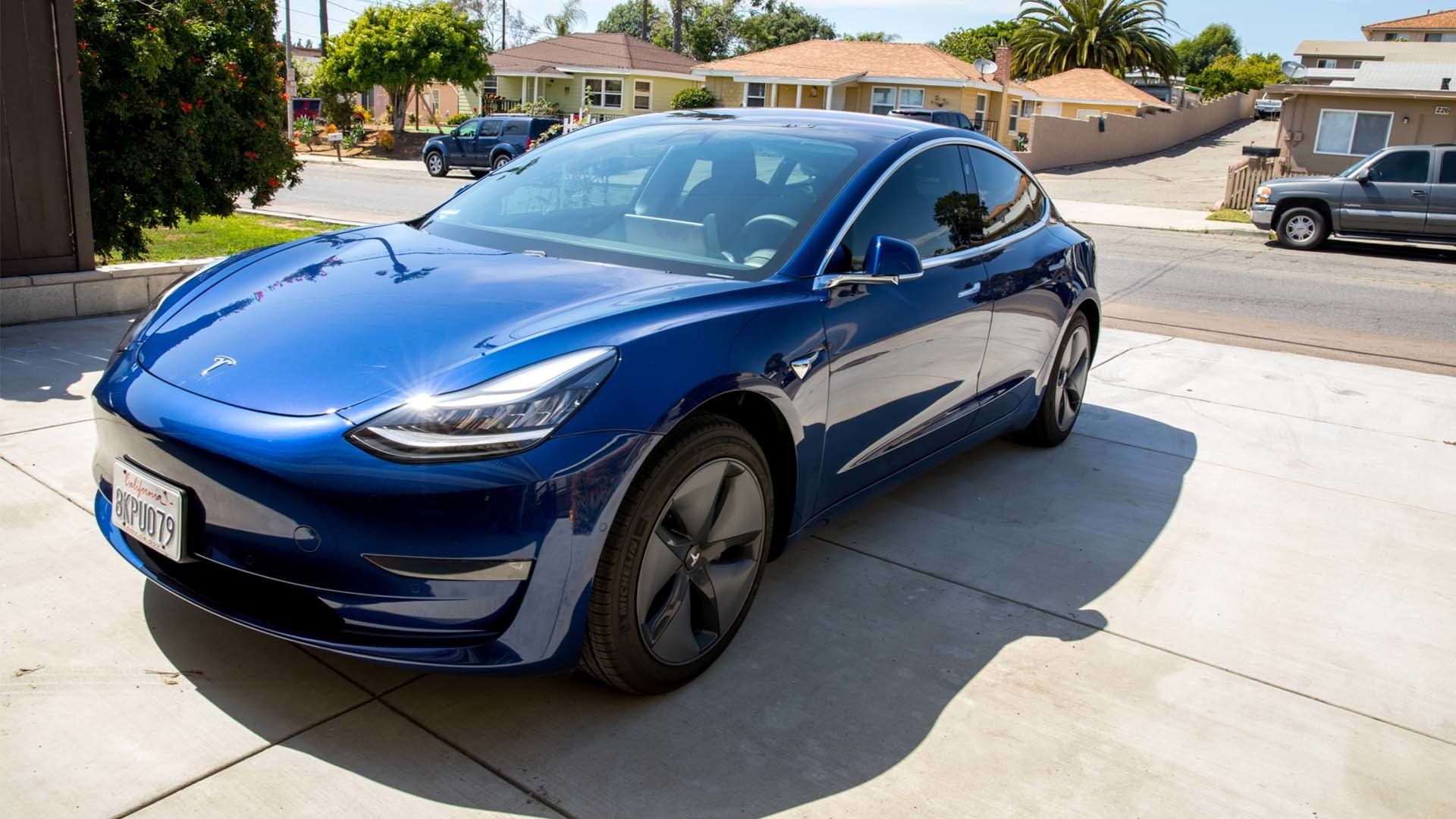 Blue sports car with window tinting